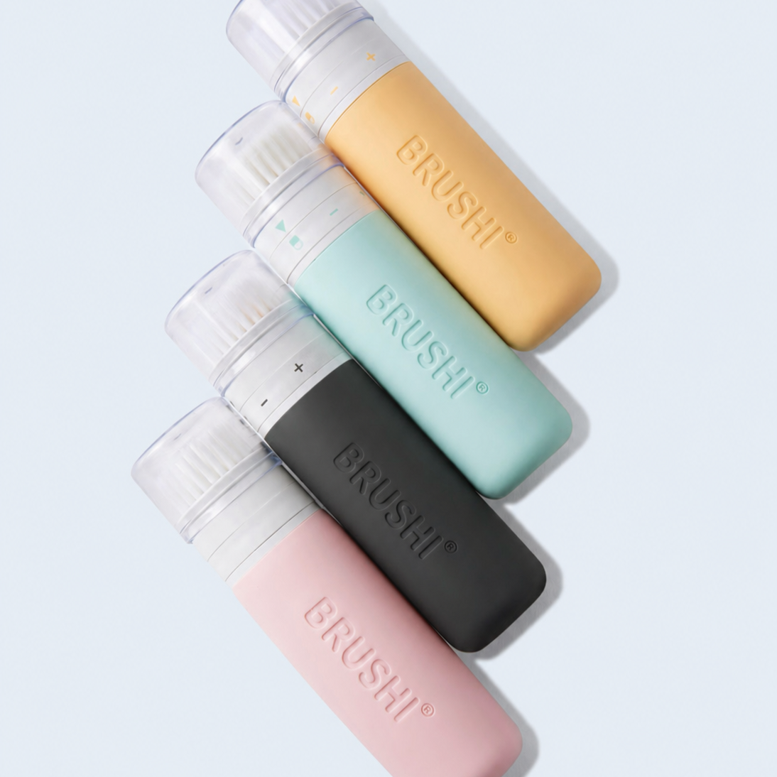 Brushi the refillable sunscreen applicator. with a soft built in brush to blend sunscreen. No hard plastic rollerballs. four colors