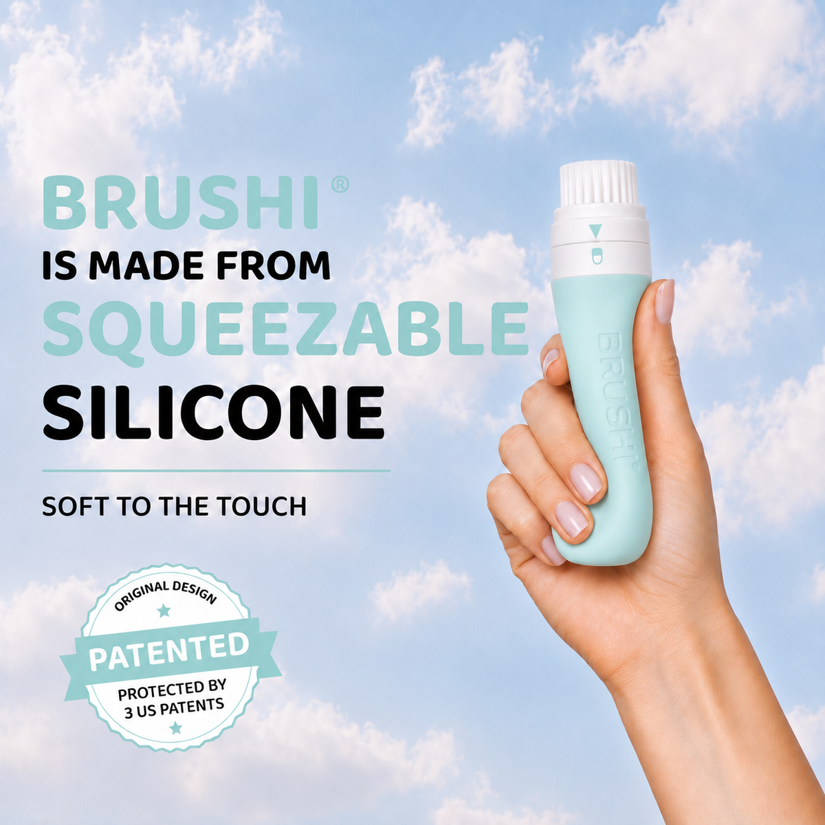 A hand holding a Brushi squeezeable silicone sunscreen applicator bottle against a blue sky with clouds background. Text on the left reads 'BRUSHI IS MADE FROM SQUEEZABLE SILICONE' and 'SOFT TO THE TOUCH' with a patented design badge.